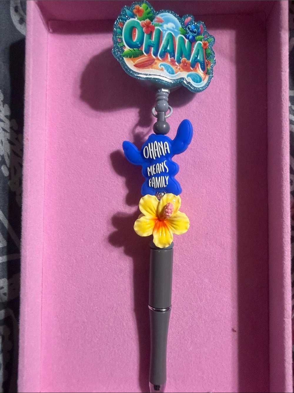 Ohana Beaded badge reel with retractable pen.